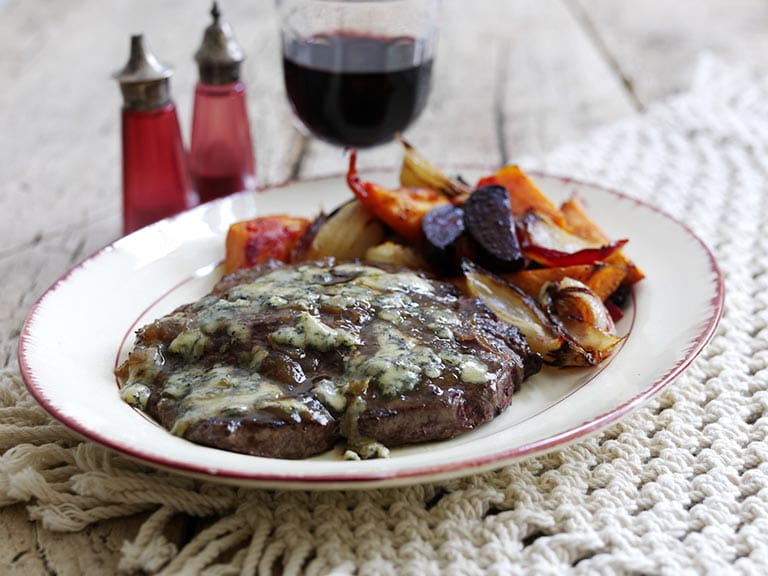 Steak with blue cheese sauce