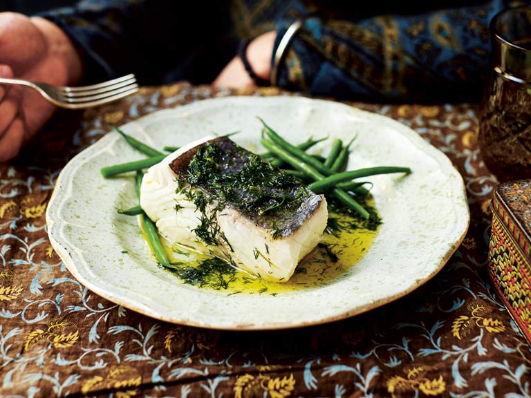 Poached halibut in a buttery dill sauce