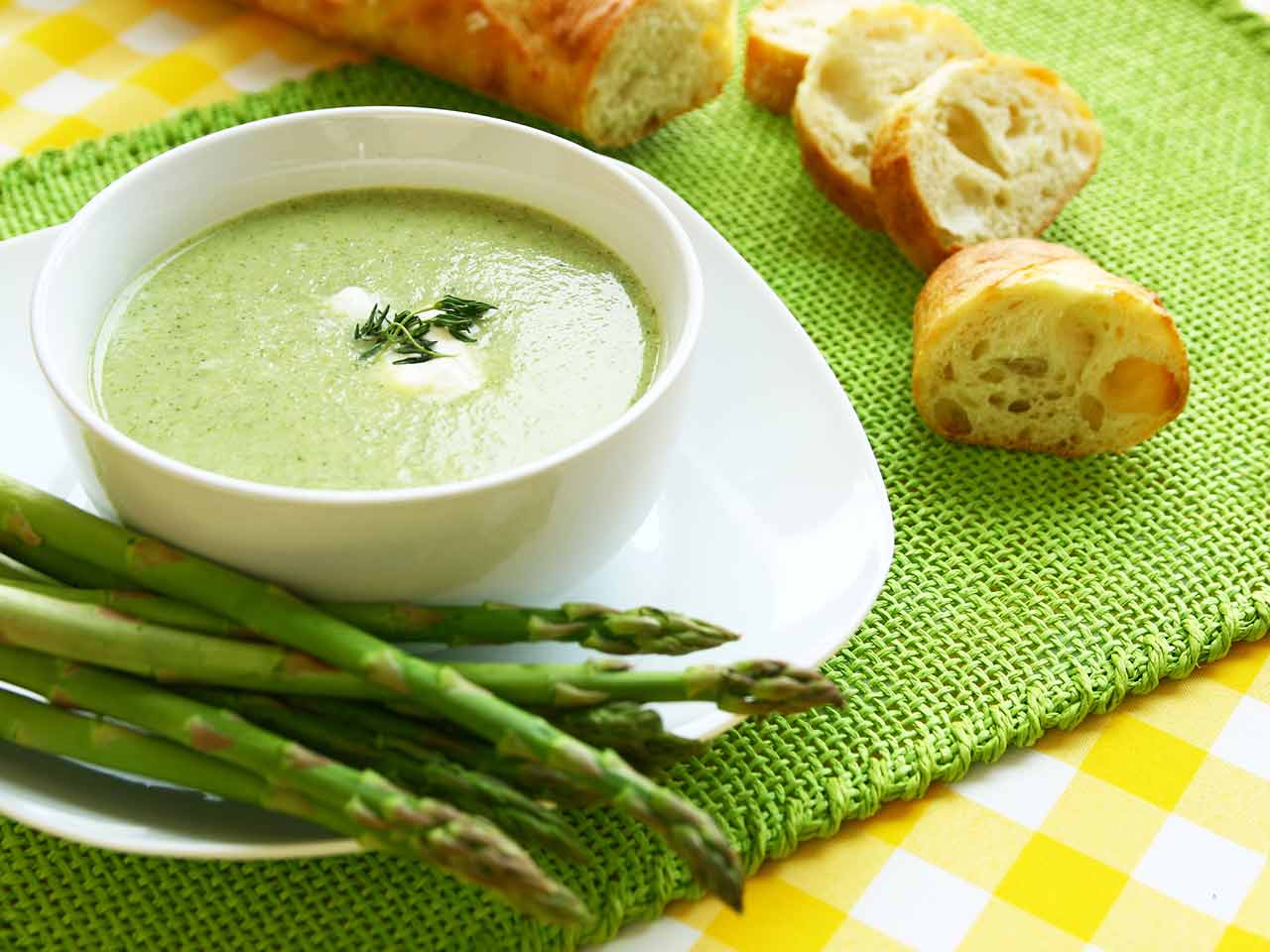 Asparagus and spinach soup topped with chive crème fraîche 