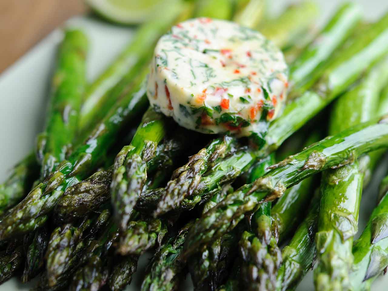 Roasted British asparagus with chilli and lime butter 
