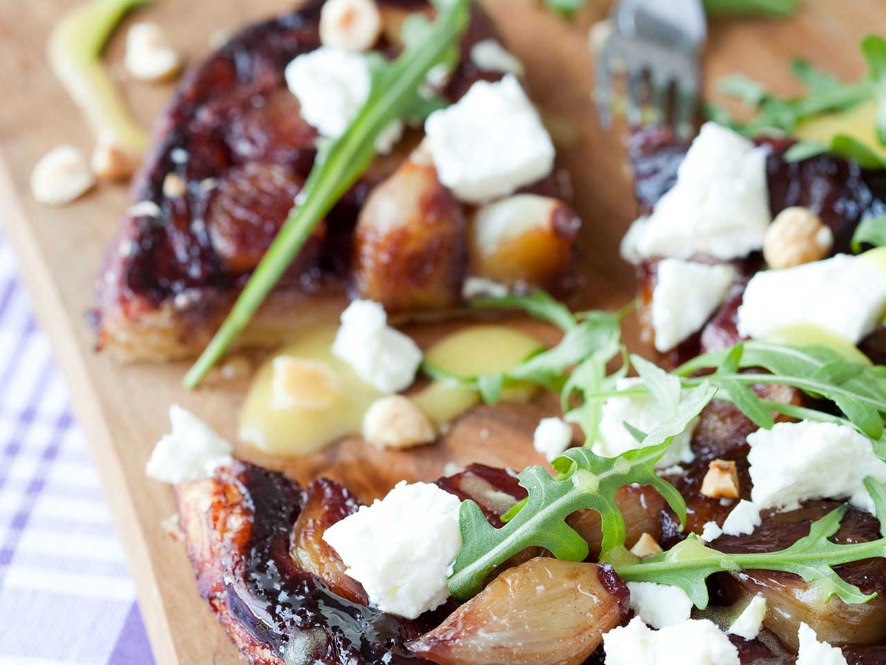 Tatin of shallots and port with creamy goat’s cheese 