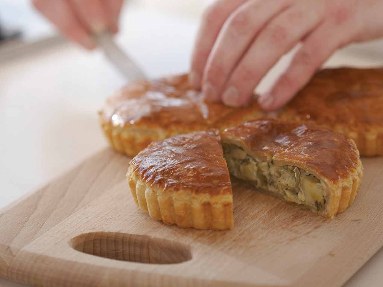 Artichoke and olive puff pastry pies