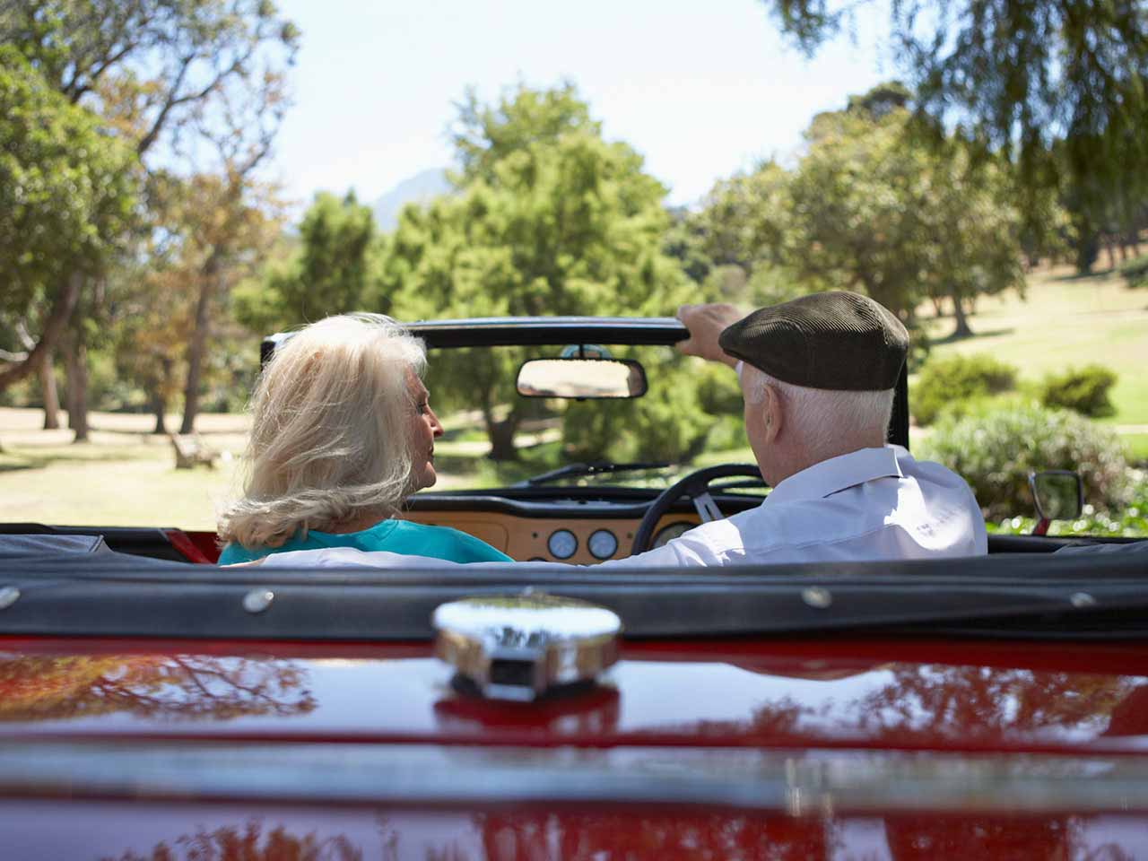 Senior couple out for a drive