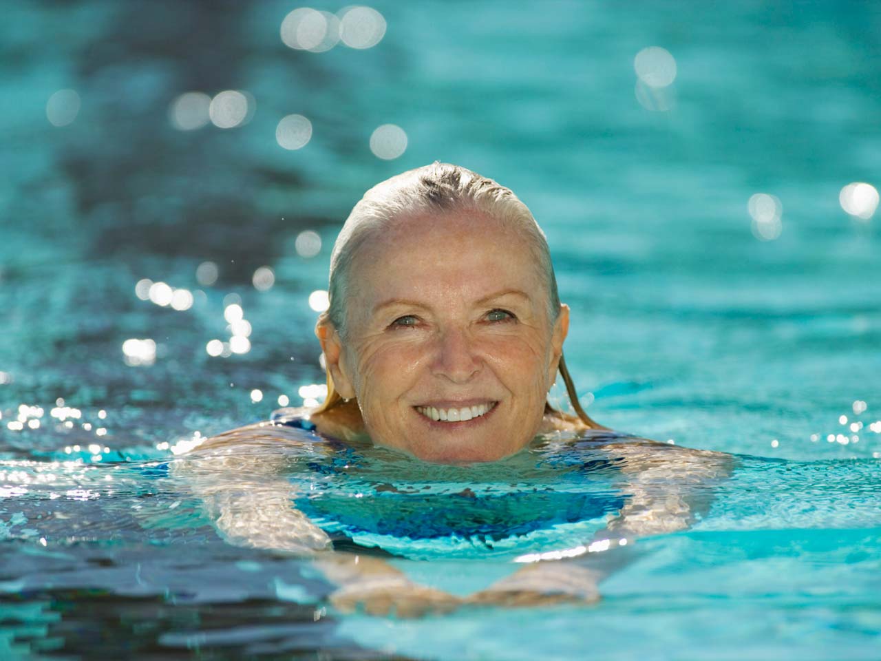 Woman swimming for fitness