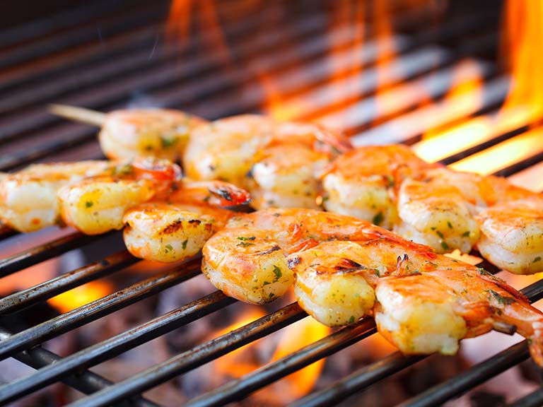 Grilled prawns on a barbecue