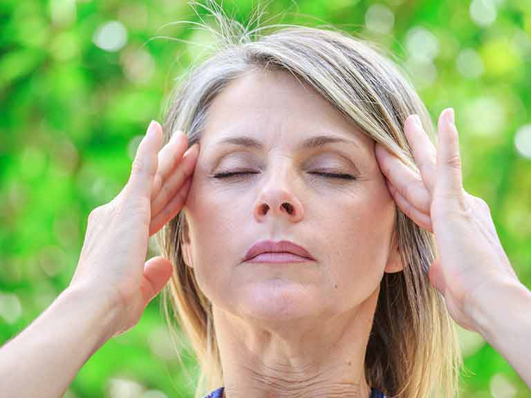 Woman feeling dizzy