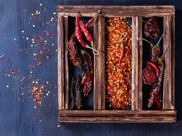 Chili peppers in a wooden box