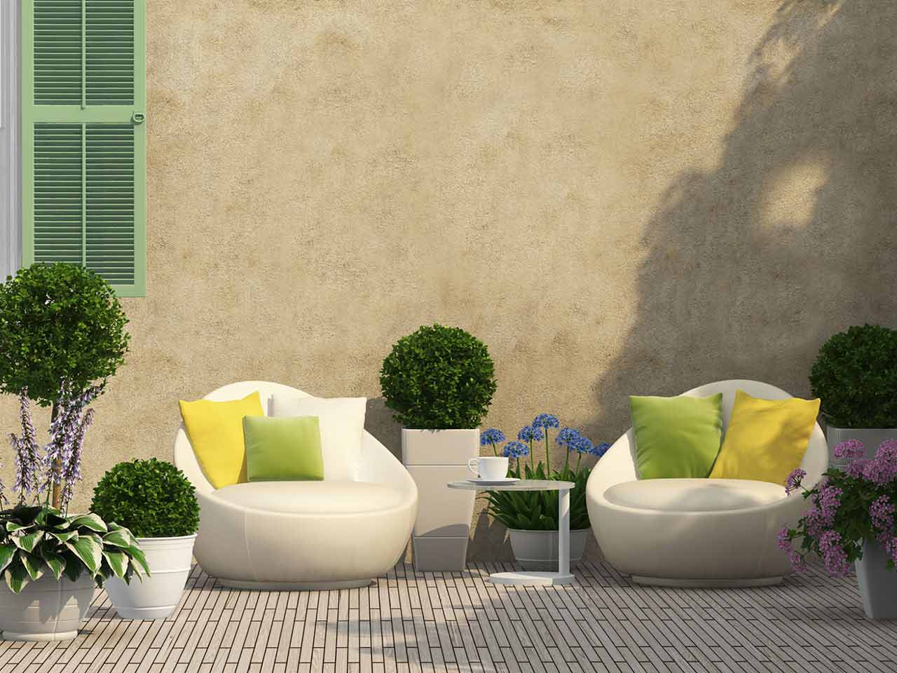 Courtyard garden with furniture and topiary