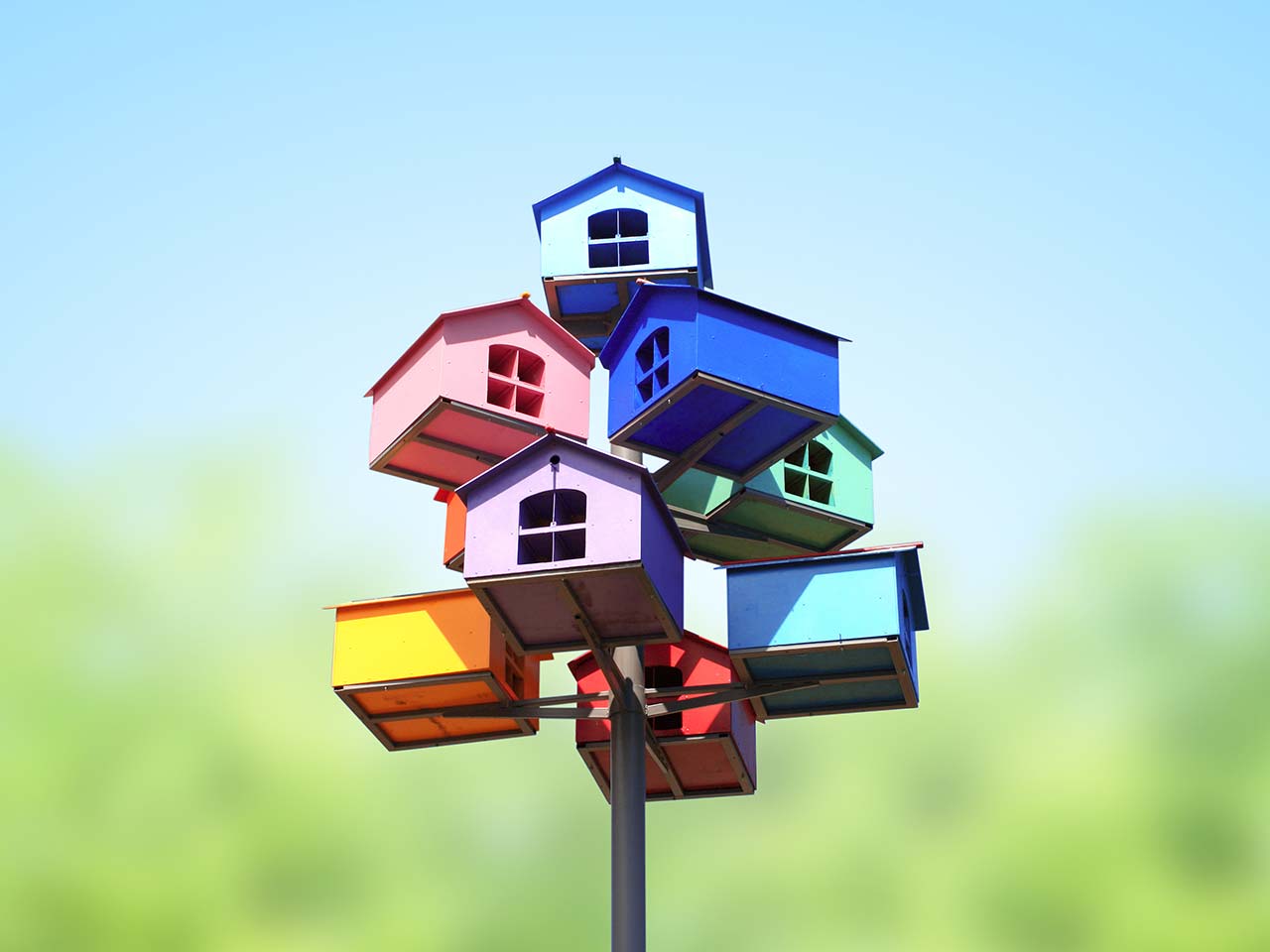 Colourful model houses as nesting boxes