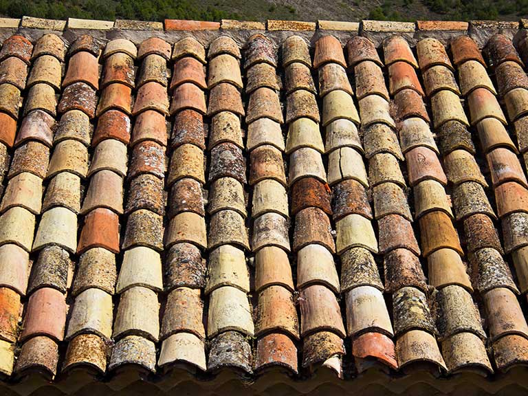 Crumbling clay roof tiles