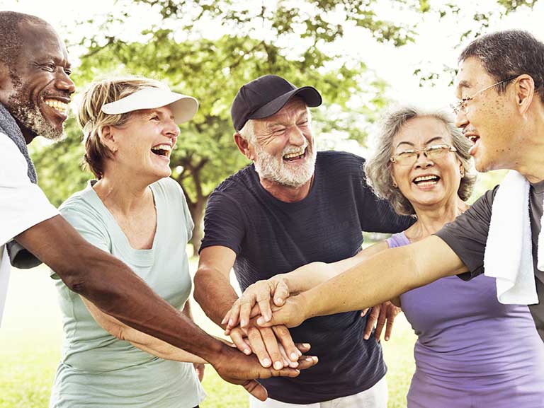 A group of people cohousing go exercising together