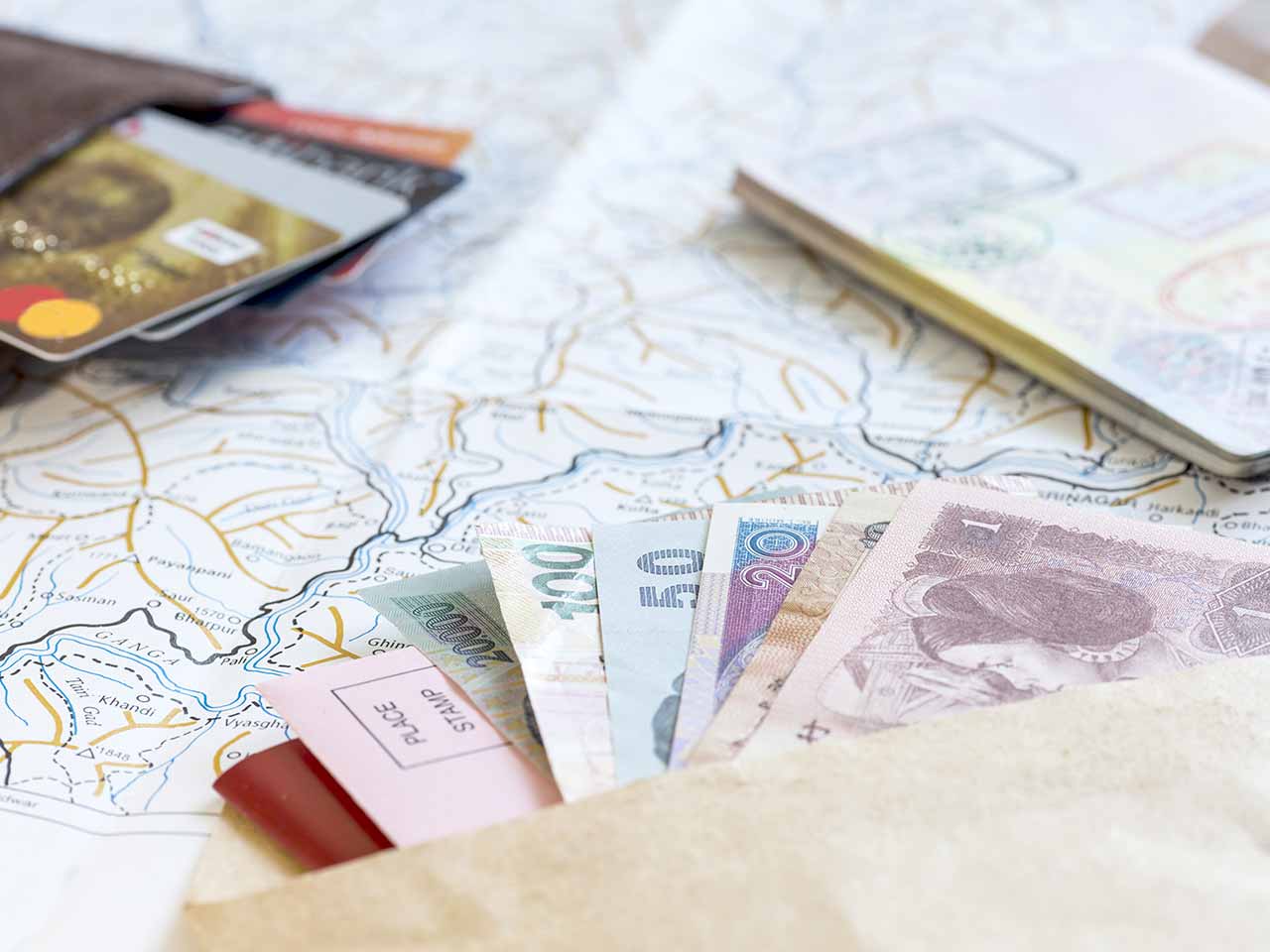 Passport, money and a map