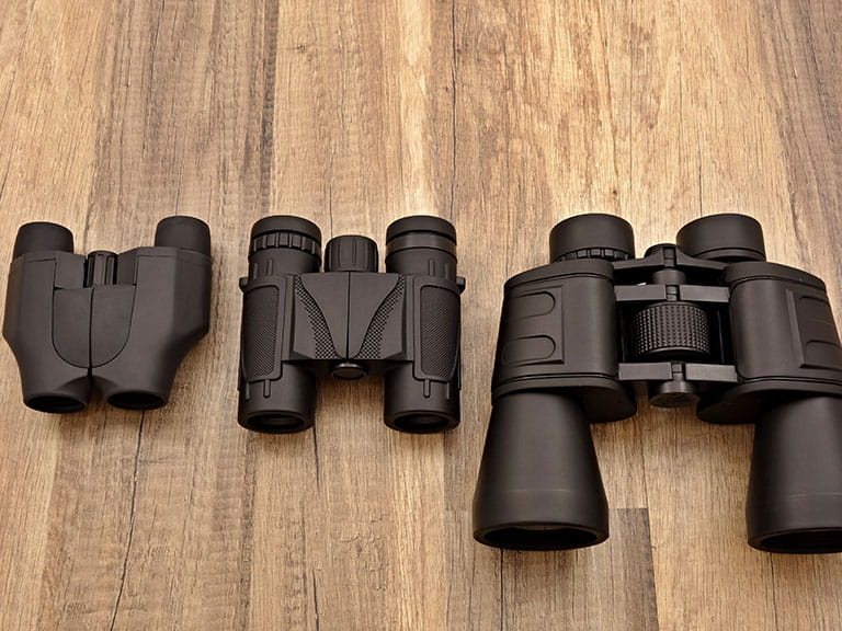 Three different types of binoculars