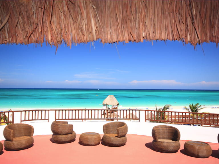 Tourist resort balcony overlooking a stunning tropical beach