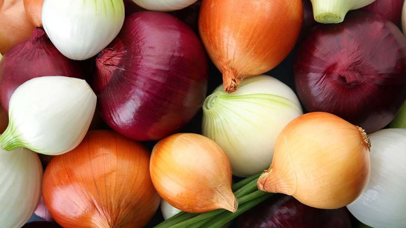different coloured onions - red, white and brown