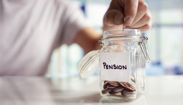 A person putting coins in a jar labelled 'Pension'