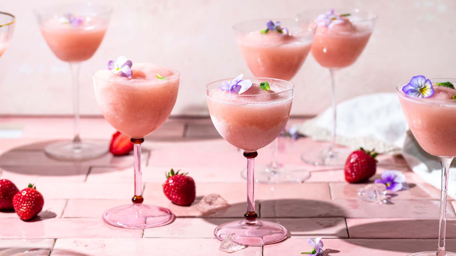 Glasses of strawberry and rose frose