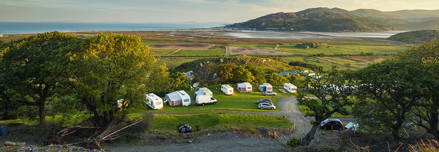 Aerial view of a caravan park near the coast