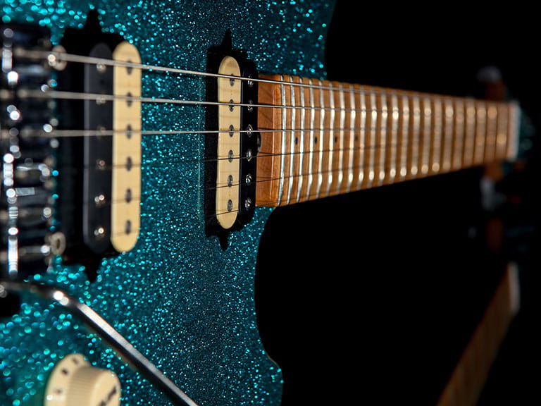 A sparkly blue guitar to represent the glam rock of Marc Bolan