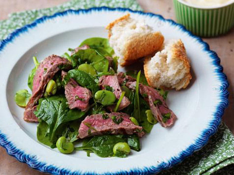 Beef with broad bean and spinach salad