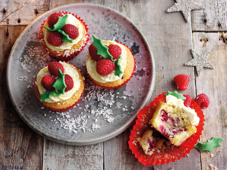 Coconut and raspberry Christmas cupcakes