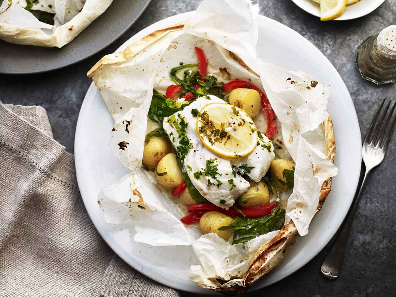 Cod en papillote with baked new potatoes