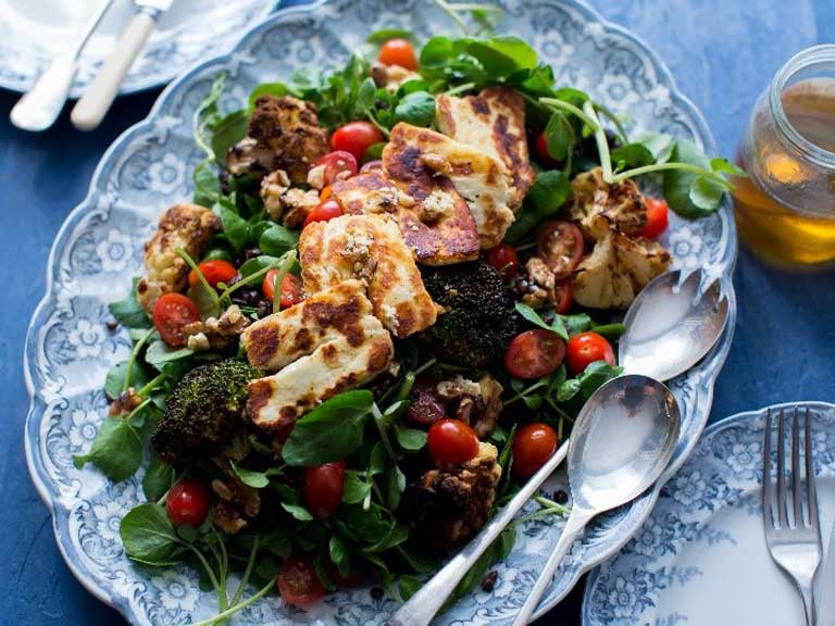 Roasted broccoli and cauliflower with puy lentils, halloumi and watercress