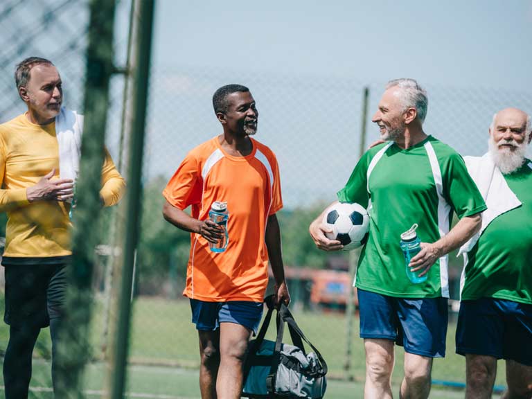 Football for over 50s benefits, teams and walking football picture image