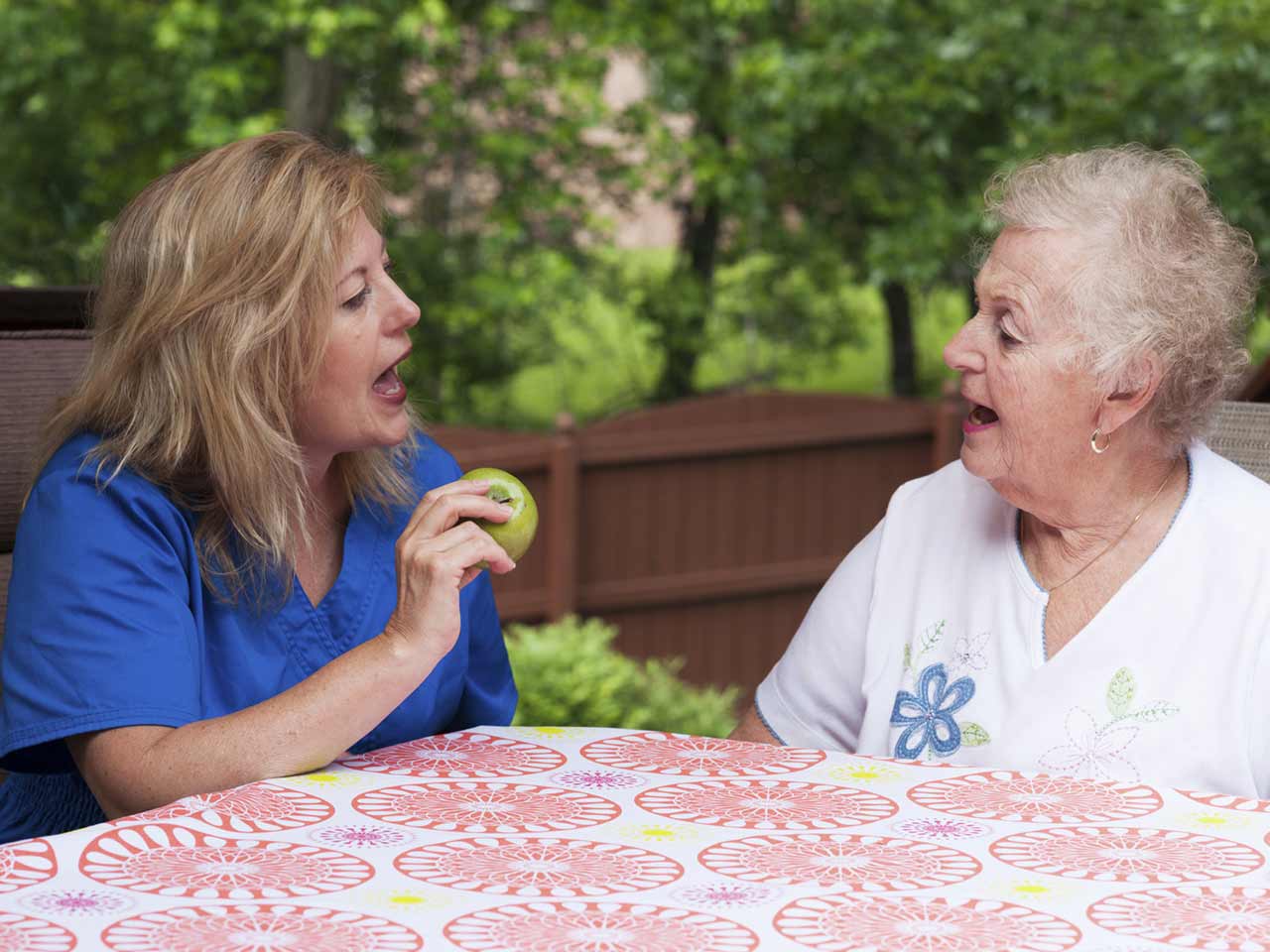 Speech therapist with stroke patient