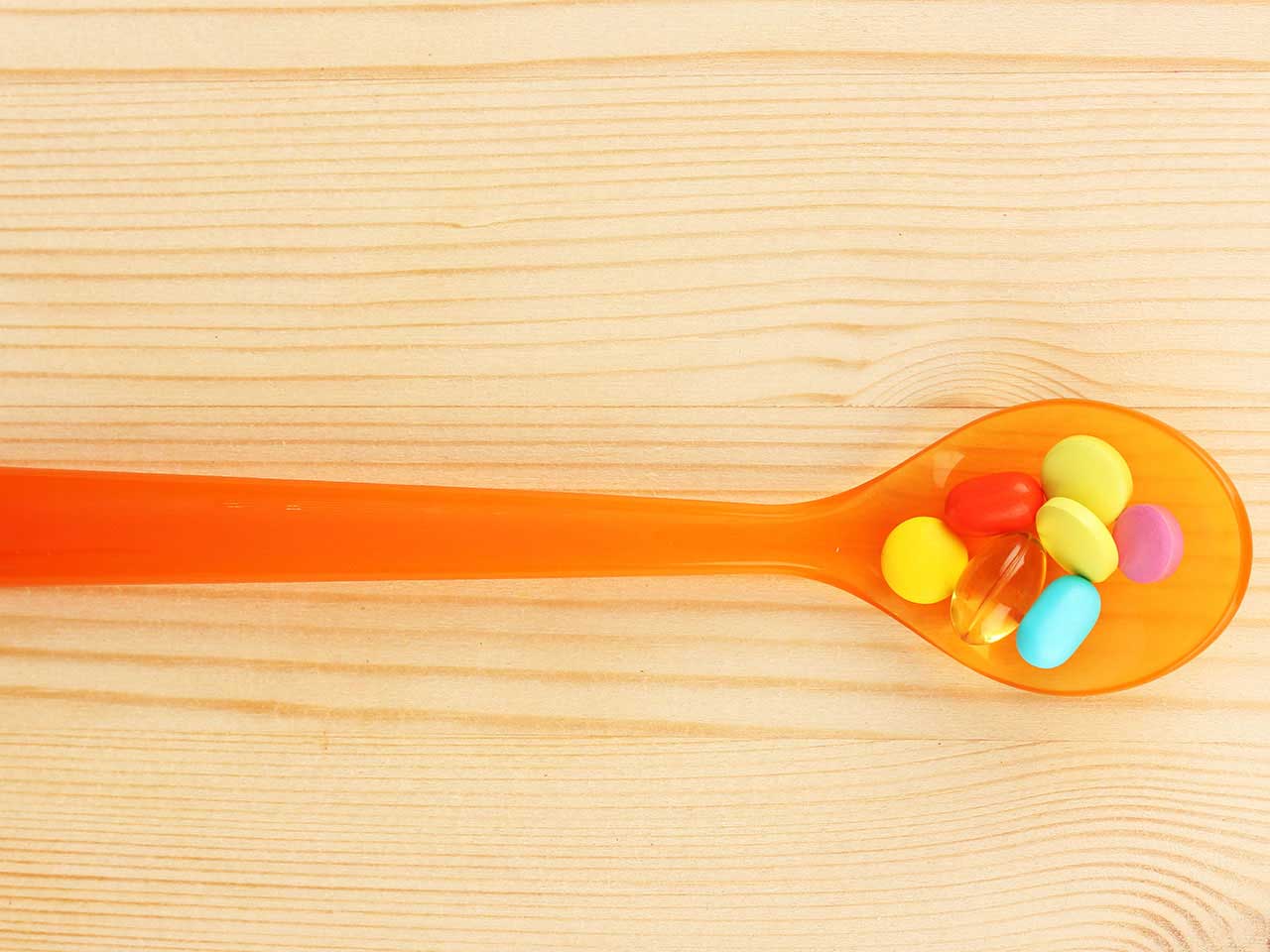 Spoon holding vitamins