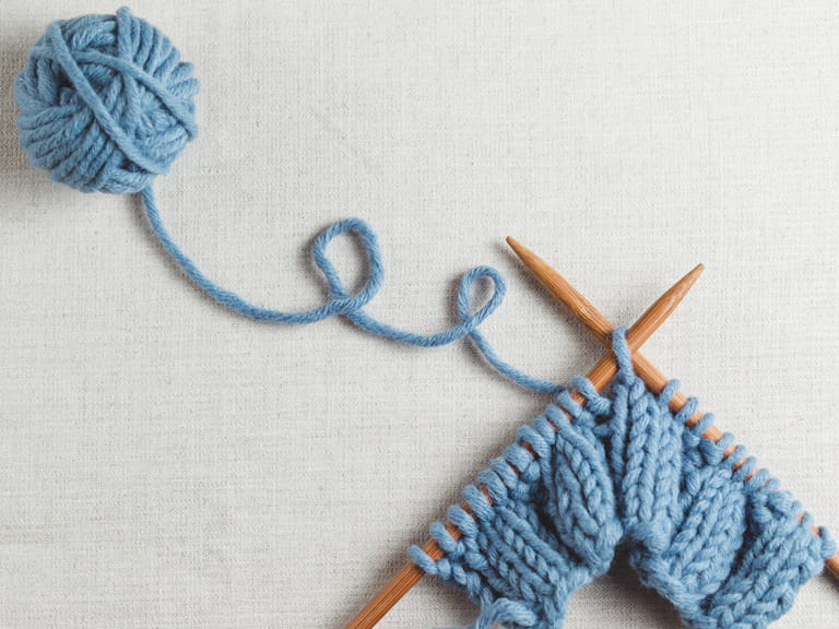 Knitting needles and yarn