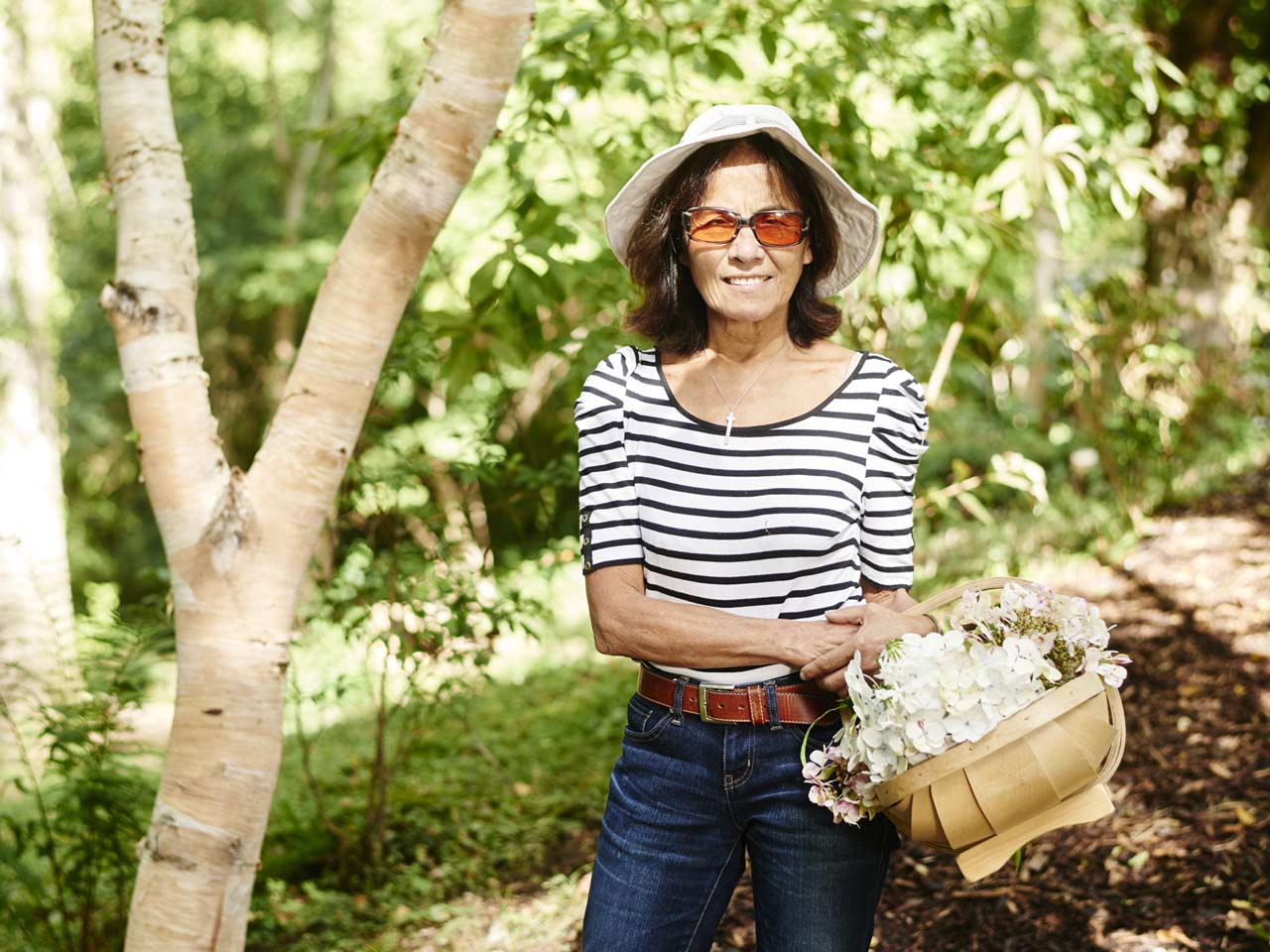 Sue Arnold in her all-white woodland garden. Photograph by Paul Stuart