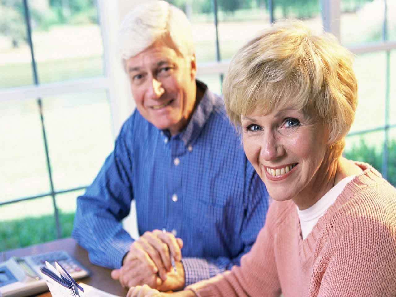 Mature couple looking over their finances