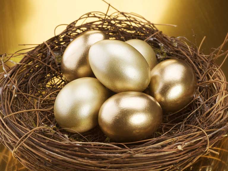 Gold eggs in a basket