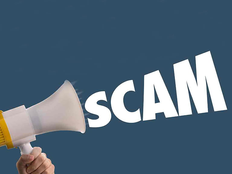 A megaphone with the word SCAM to represent the scams relating to COVID-19, or coronavirus