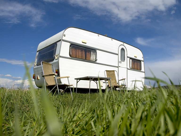 Caravan in a field in spring