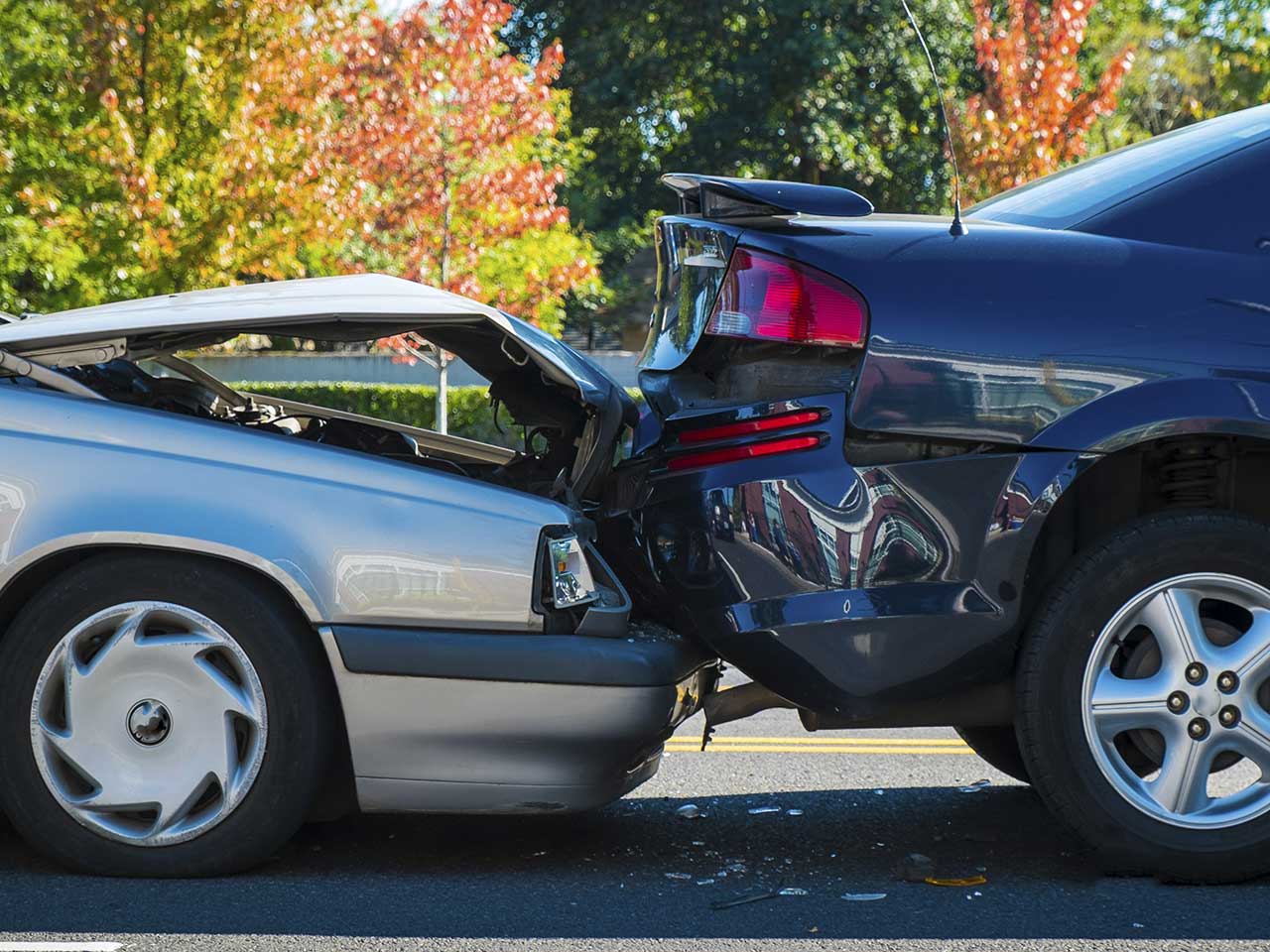 A car accident where one vehicle crashes into the back of the car in front. 