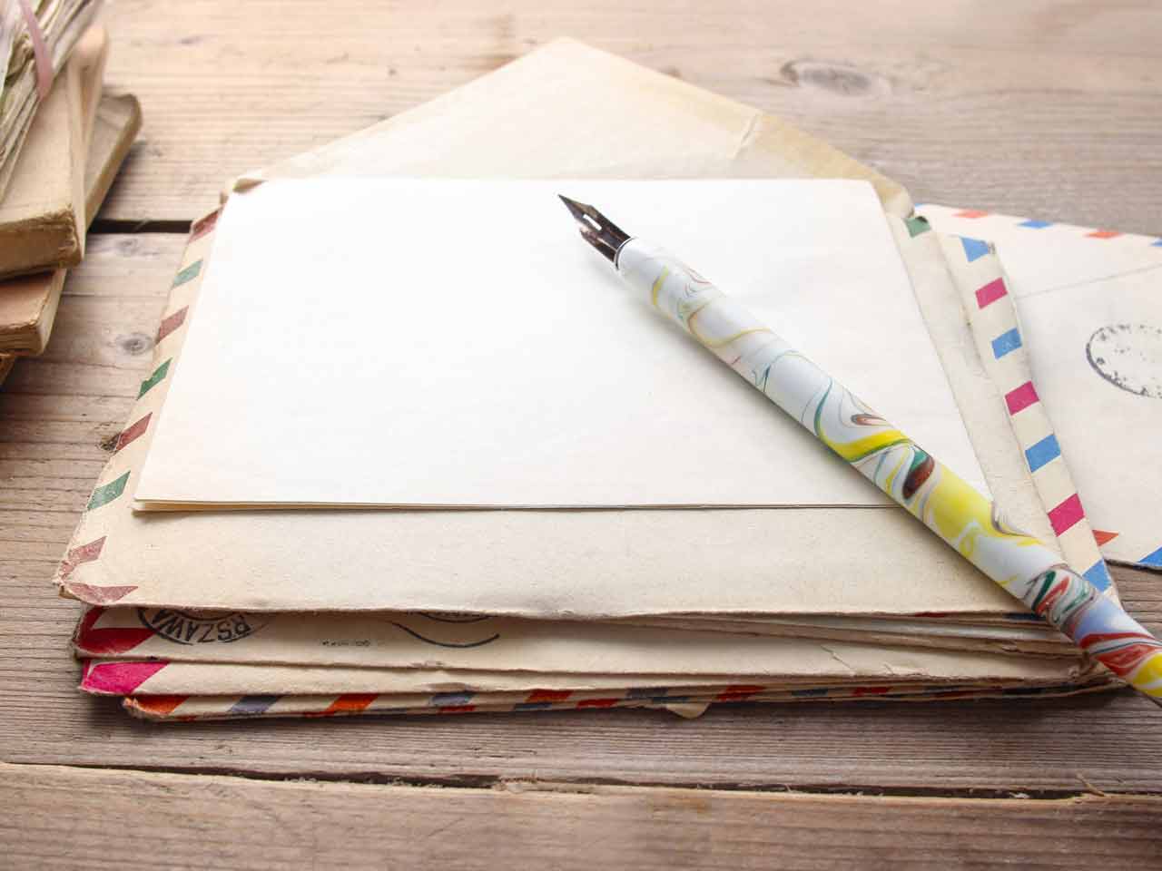 Paper and pen for writing a letter