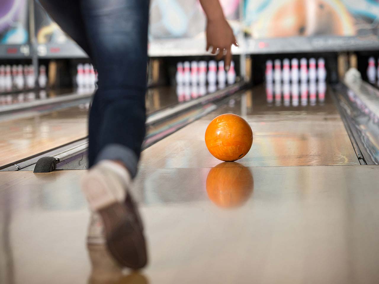 Woman ten pin bowling