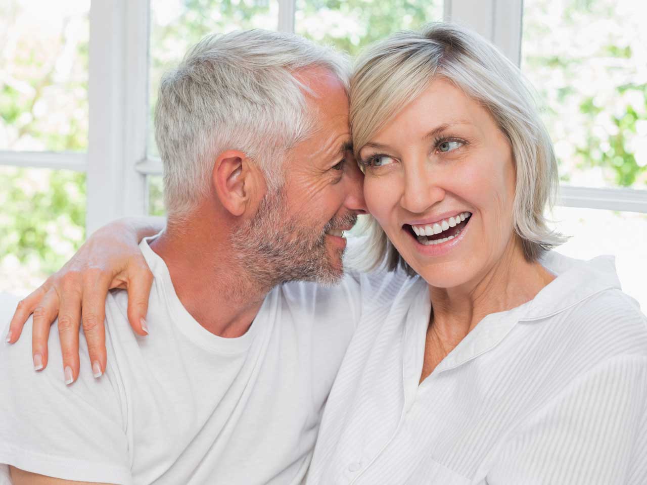 Mature Couple Enjoy Union With Nature, Fresh Air And Stunning Views