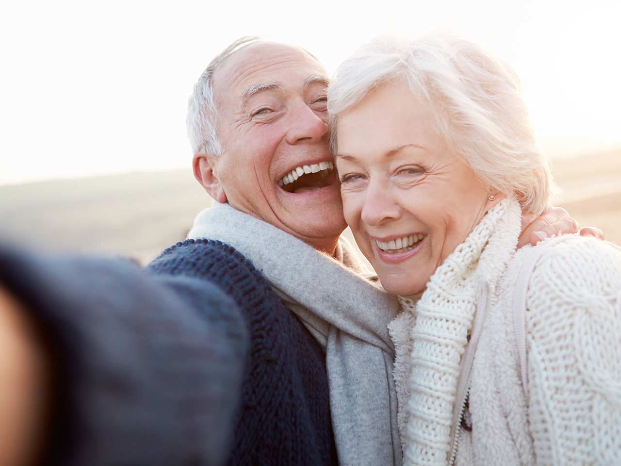 Seniors smiling taking a selfie