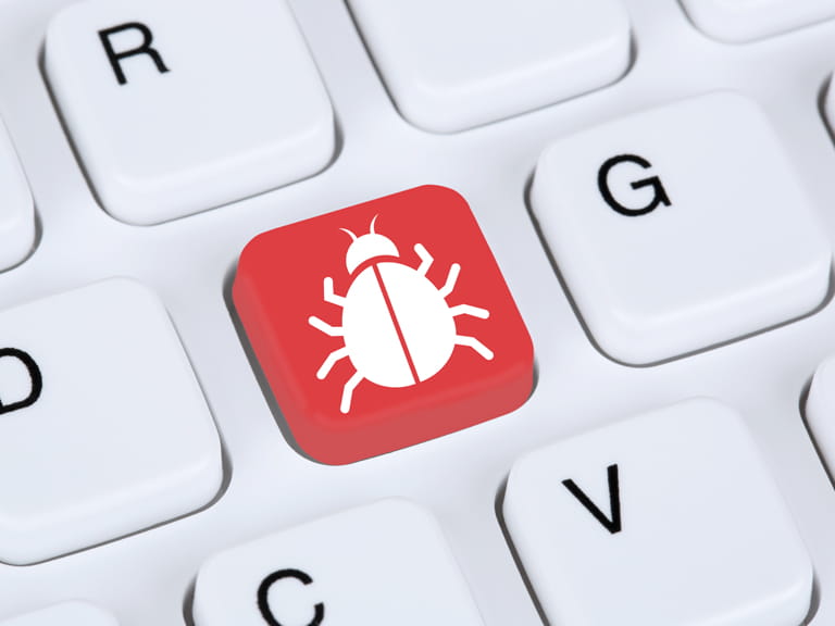 Virus symbol on a computer keyboard to represent freeantivirus