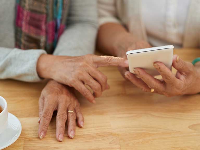 Two older women use these tips to regain control of their online lives