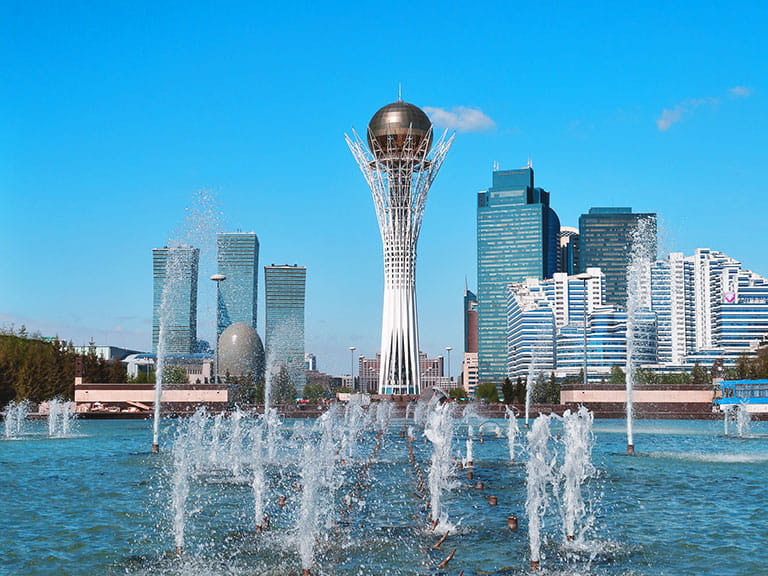Bayterek tower in Kazakhstan in front of beautiful fountains