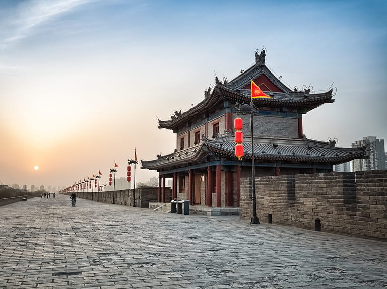 xian city wall and ancient tower at dusk