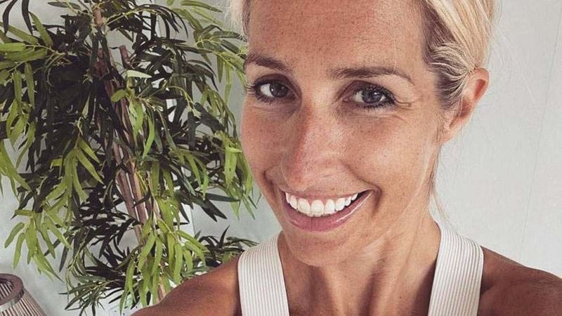 Jade Gooding, yoga instructor; headshot of a smiling blonde woman with a houseplant in the background