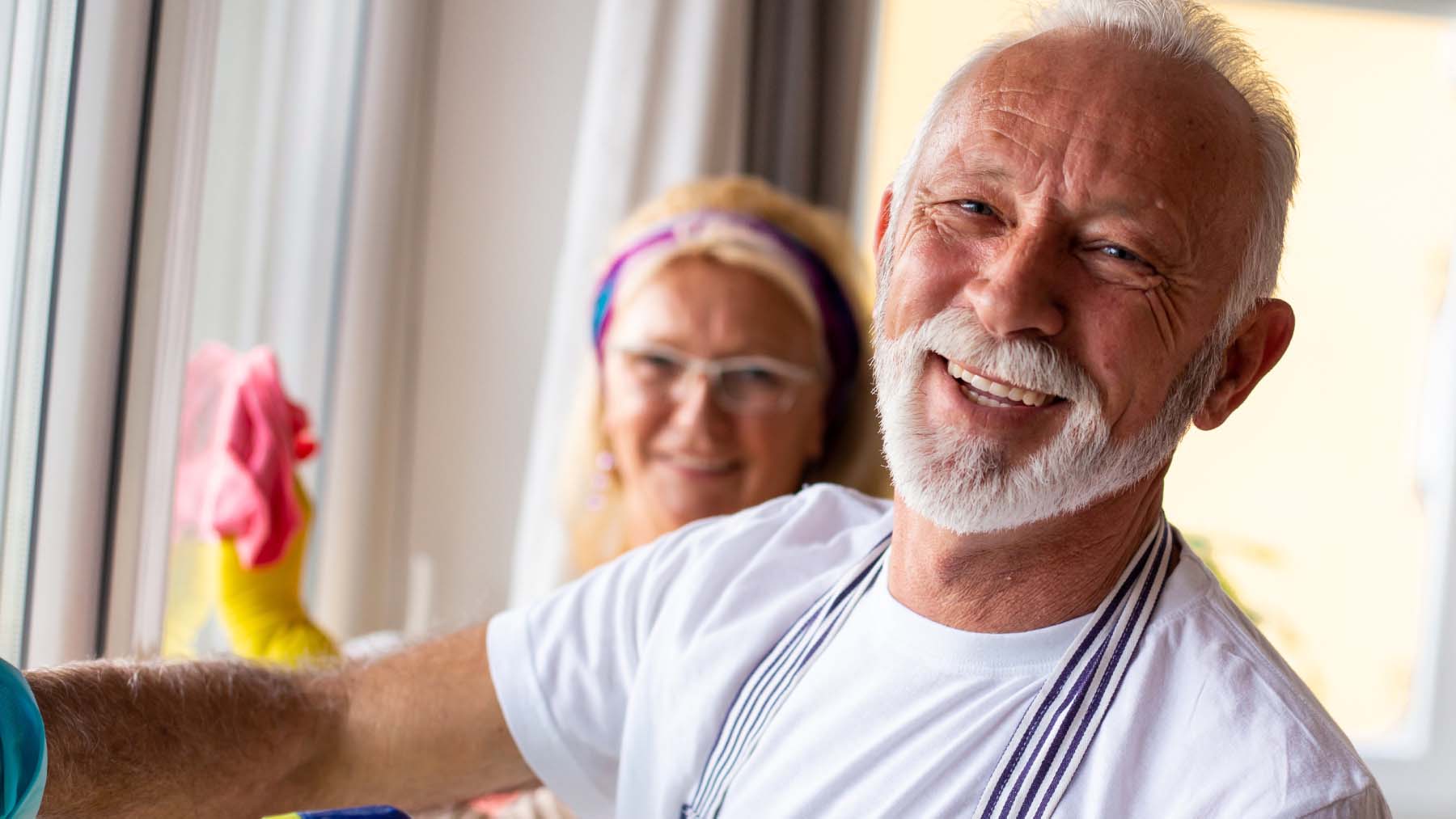 Man and woman cleaning 