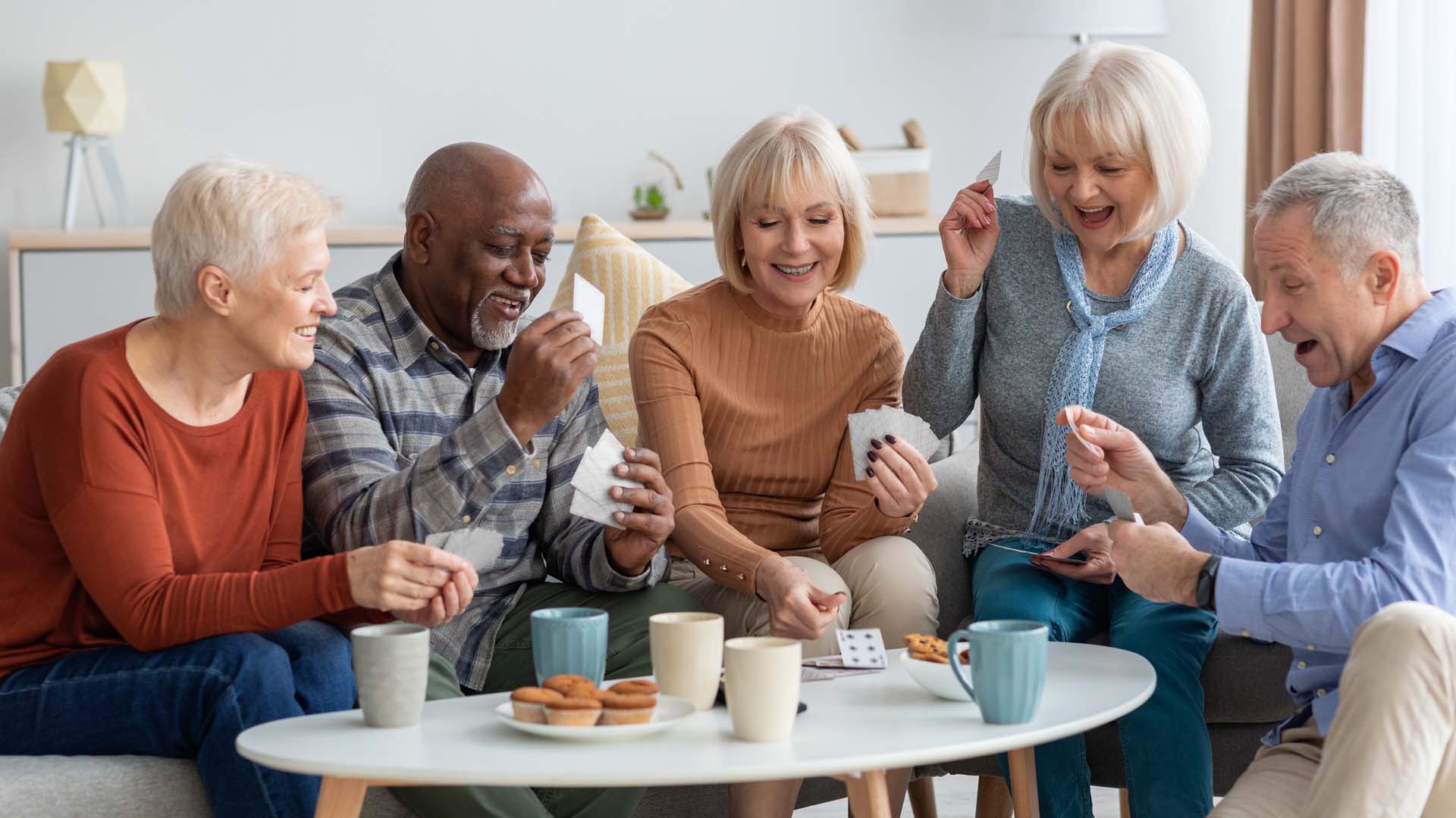 Group of people playing cards