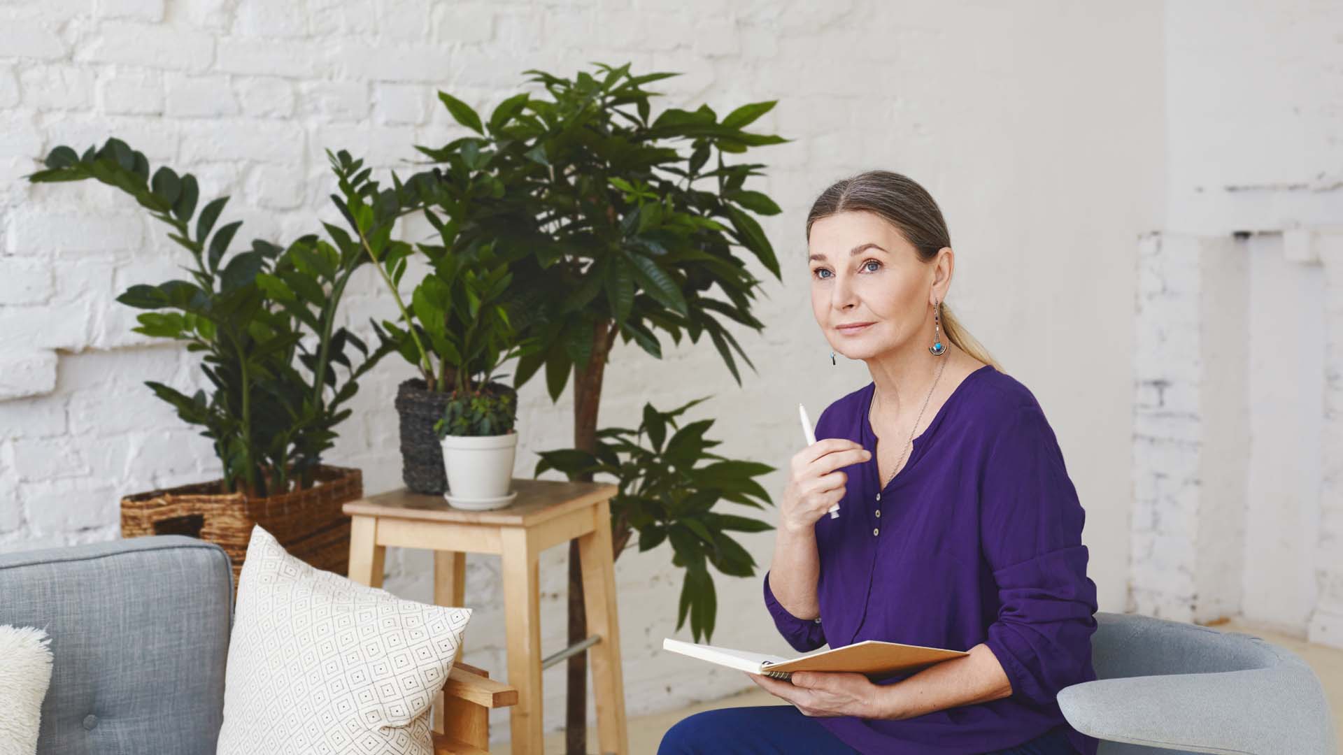 Woman writing down her thoughts