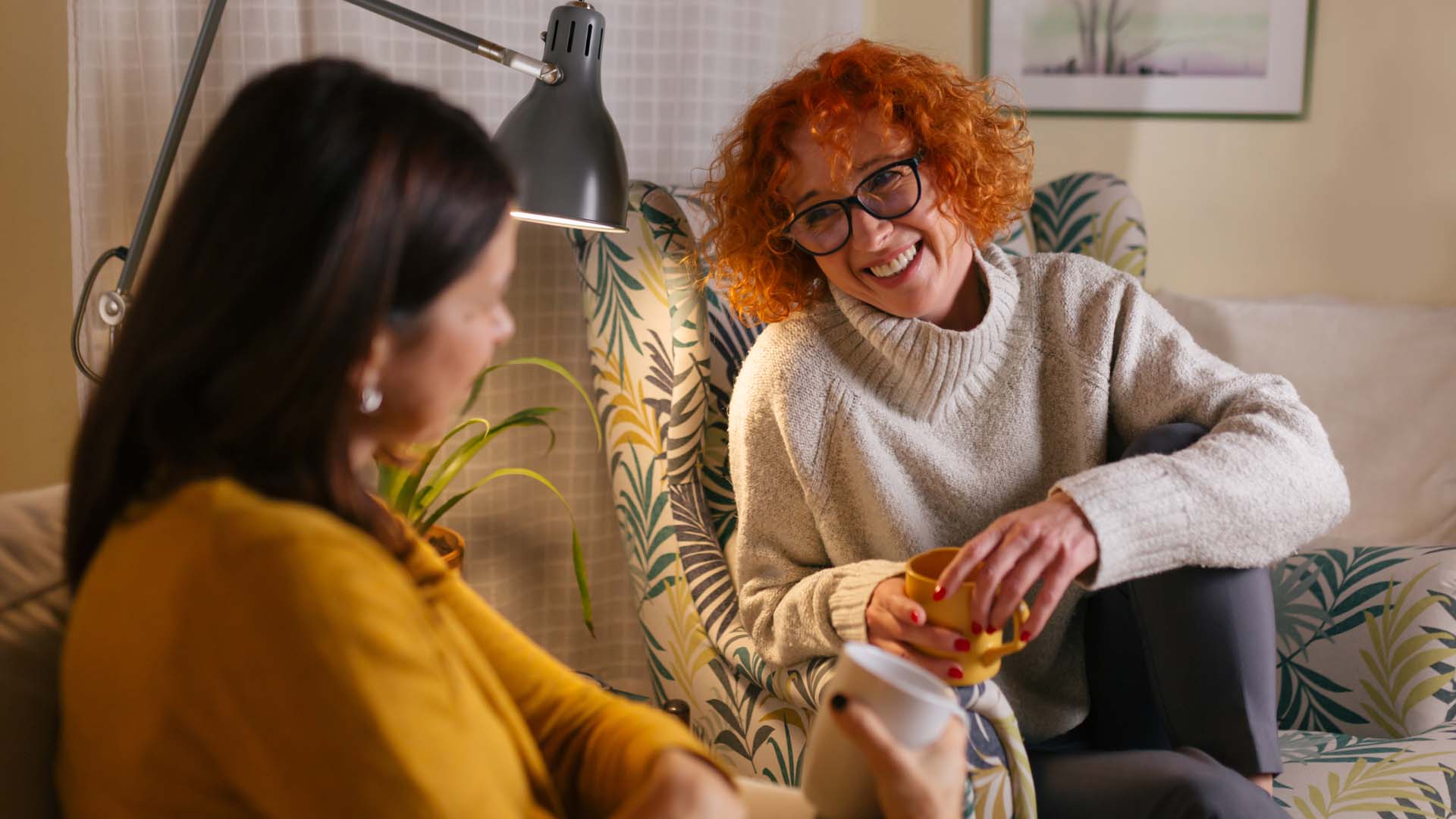 two women joyfully chatting
